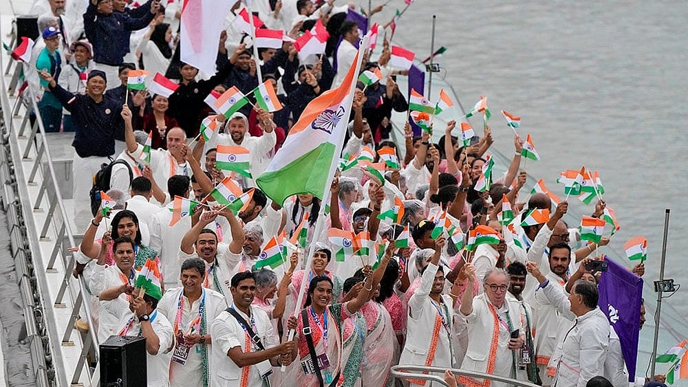 | Photo: AP/Matthias Schrader : Indian athletes during 2024 Olympics Opening Ceremony